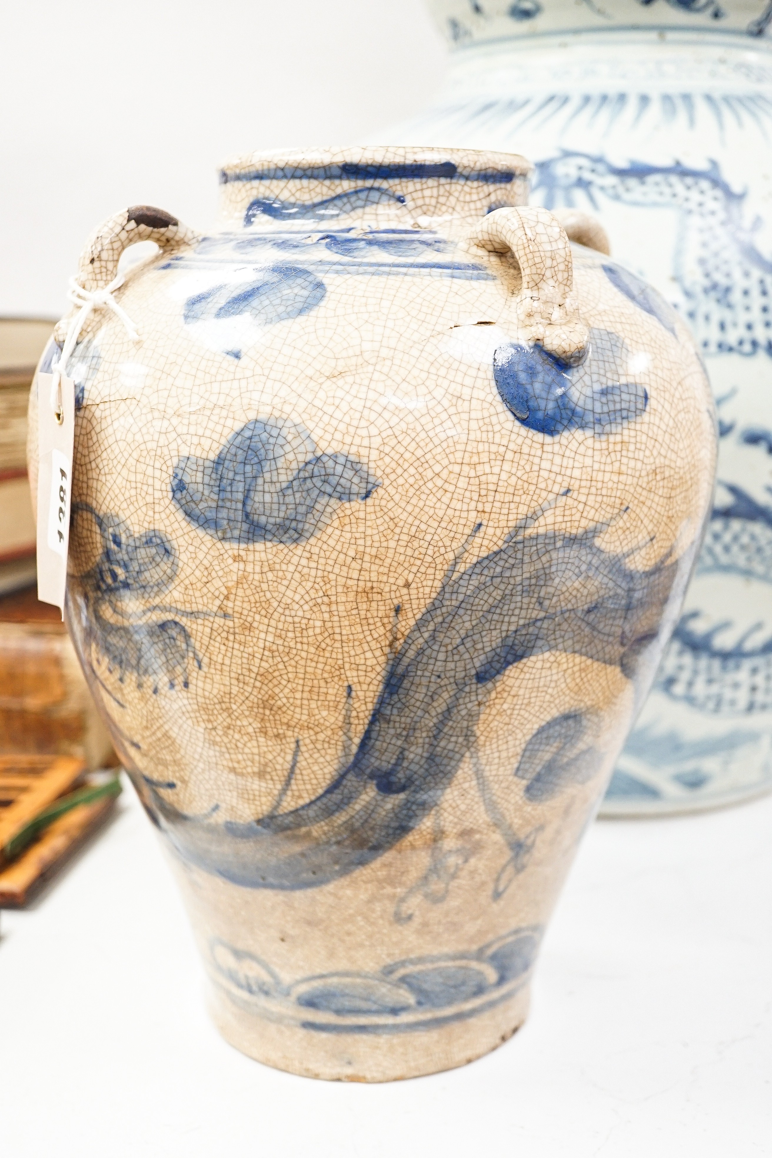 A large Chinese blue and white 'dragon' double gourd vase, 64cm high and an Annamesse style blue and white crackle glaze jar